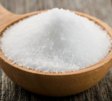 A pile of salt grains representing sodium, a mineral essential for bodily functions and electrolyte balance.